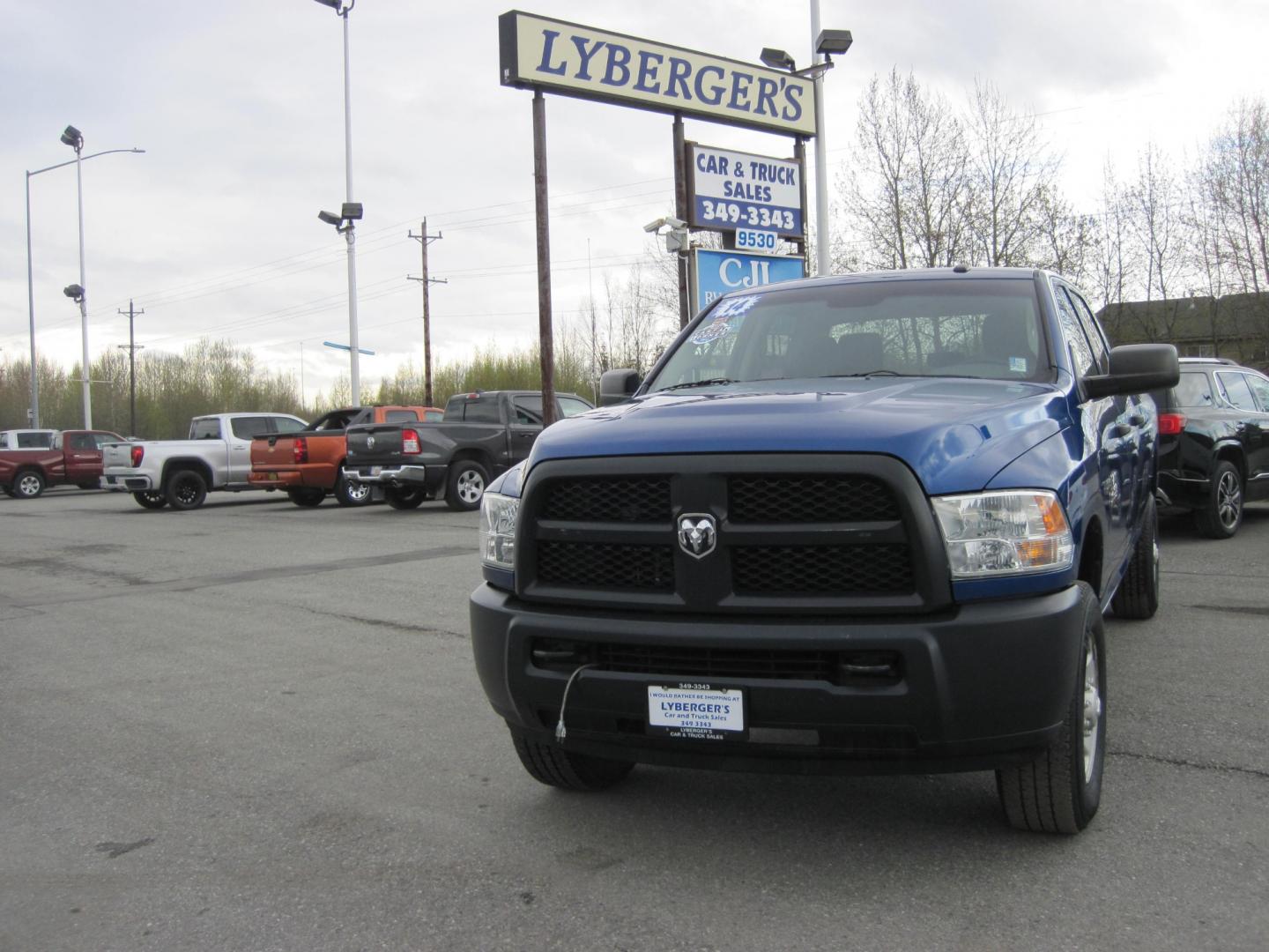 2014 blue /gray RAM 2500 Tradesman Crew Cab 4WD (3C6TR5HT1EG) with an 5.7L V8 OHV 16V engine, automatic transmission, located at 9530 Old Seward Highway, Anchorage, AK, 99515, (907) 349-3343, 61.134140, -149.865570 - Low miles on the Ram 2500 come take a test drive - Photo#1